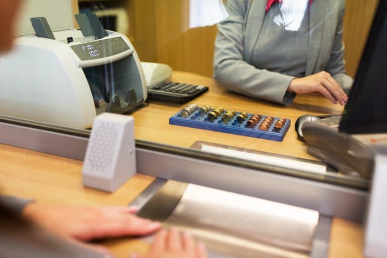 clerk processing a business cashier’s check